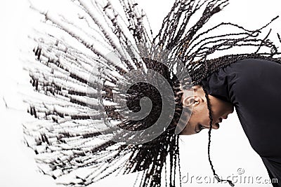 Girl throwing down her braids Stock Photo