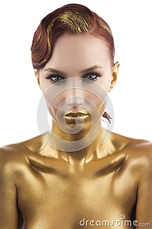 The girl tinted in gold, isolated on a white background Stock Photo