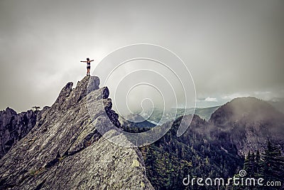 Girl on top of a Rocky Canadian Mountain Stock Photo
