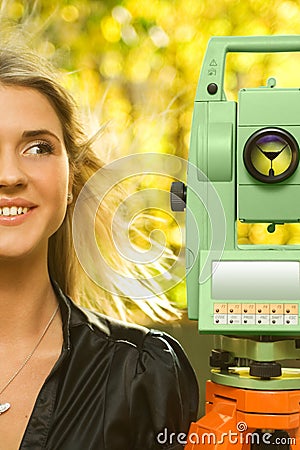 Girl and Total Station Stock Photo