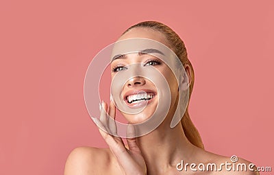 Girl Touching Perfect Clean Skin On Face Posing In Studio Stock Photo