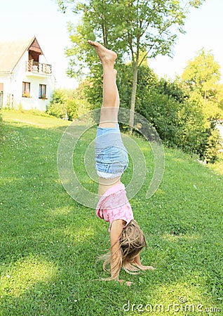Girl Training Handstand Stock Photo - Image: 42647806