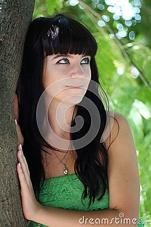 The girl in a tree shade Stock Photo