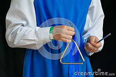 Girl with triangle. Stock Photo