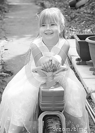 Girl on Trike Stock Photo