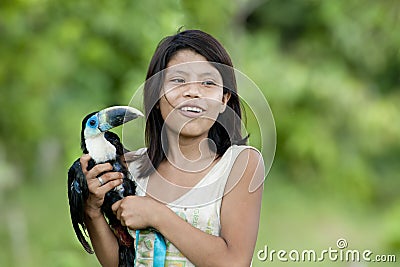 Indian girl with turquoise toucan bird Editorial Stock Photo