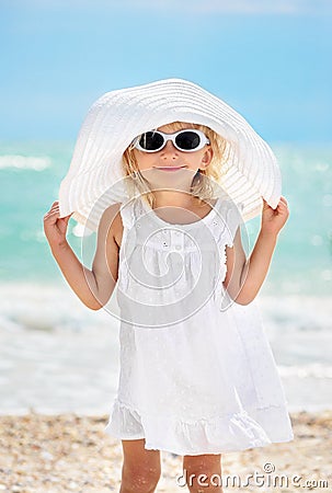 Girl two years old in a white dress Stock Photo