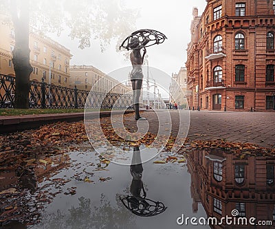 Girl with an umbrella Sculpture by Vladimir Zhbanov at Mikhailovsky Garden Square - Minsk, Belarus Editorial Stock Photo