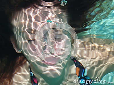 Girl under water Stock Photo