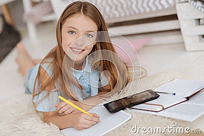 Girl of unearthly beauty smiling into camera Stock Photo