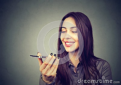 Girl using a smart phone voice recognition function on line Stock Photo