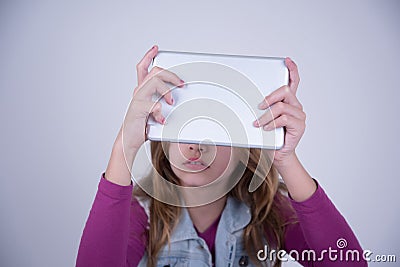 Girl using a tablet Stock Photo