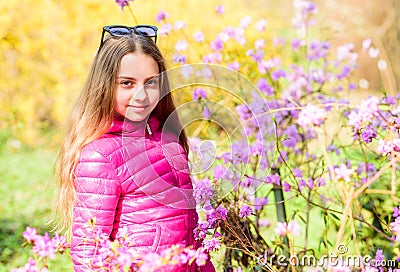 Girl walk in botanical garden. Enjoying nature in garden. Kid cute fancy child spend time in park. Plants grown for Stock Photo