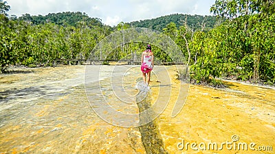 Girl walking on Emerald pool waters near Krabi, Thailand Editorial Stock Photo