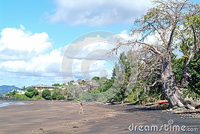 Girl walking on Sakouli beach in Mayotte island, France Editorial Stock Photo