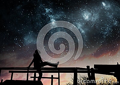 Girl watching the stars Stock Photo