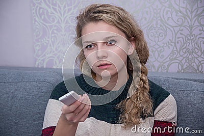 Girl watching TV Stock Photo