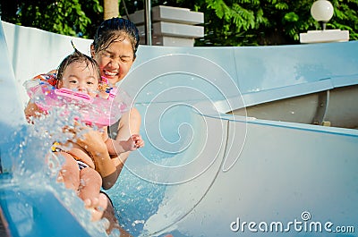 Girl in water park Stock Photo