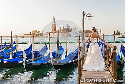 Girl on the waterfront in Venice. Editorial Stock Photo