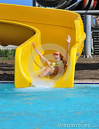 Girl on a waterslide Stock Photo