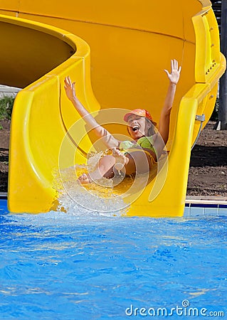 Girl on a waterslide Stock Photo