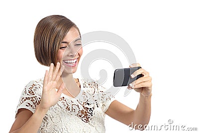 Girl waving on the smart phone while during a video call Stock Photo