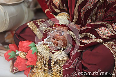 A girl wearing Punjabi bride dress in her marriage Stock Photo