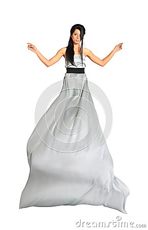 Girl wearing long silver dress isolated Stock Photo