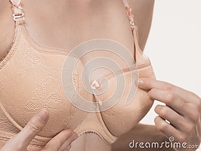 Girl wearing too big bra cup Stock Photo