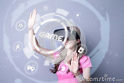 Girl wearing VR playing game Stock Photo