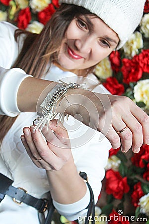 The girl wears a bracelet Stock Photo