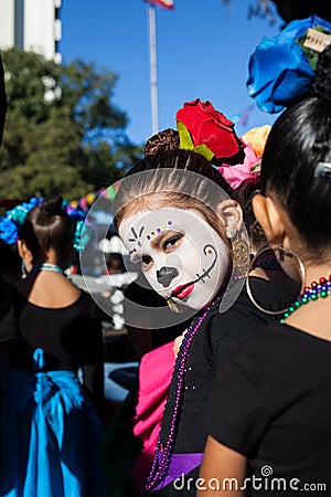 SAN ANTONIO, TEXAS - OCTOBER 28, 2017 - Girl wears face paint for Dia de Los Muertos/Day of the Dead Editorial Stock Photo