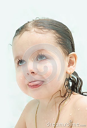 Girl with wet hair shows language Stock Photo