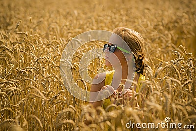 Girl in a wheat field Stock Photo