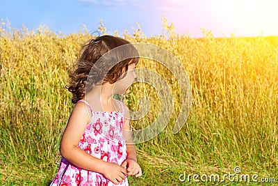 Girl in a wheat field Stock Photo