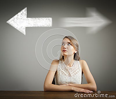 Girl in white and two arrows. Stock Photo
