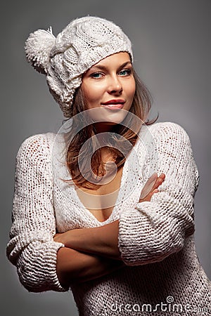 Girl in white wool and cap Stock Photo