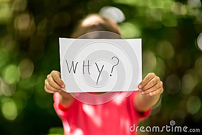 Girl with Why sign Stock Photo