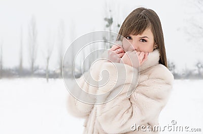 Girl in winter park Stock Photo