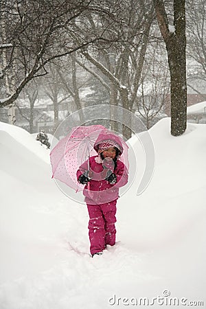 Girl In Winter Storm Stock Photo