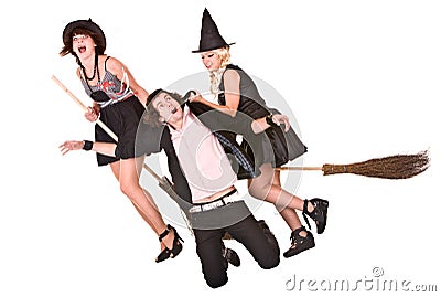 Girl witch on broom and helpless man. Stock Photo