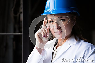 Girl worker in the factory Stock Photo