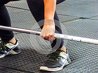 A Girl working out at th gym Stock Photo