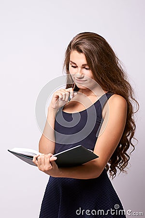 Girl writer. Beautiful portrait. White background. Businessman Stock Photo