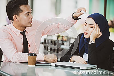 Girlfriend Having Migraine, Boyfriend Worry. Health care concept. Muslim couple Stock Photo