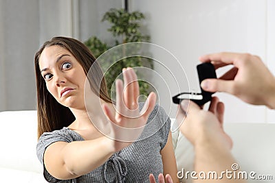 Girlfriend rejecting a marriage proposal Stock Photo