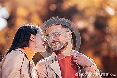 Girlfriend telling her boyfriend a surprising news Stock Photo
