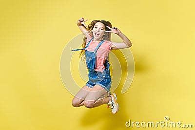 Girlish, funky, happiness, dream, fun, joy, summer concept. Very excited happy cute girl is jumping up, in summer outfit Stock Photo