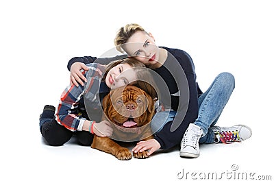 Girls with big brown dog Stock Photo