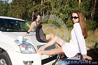 Girls with cars Stock Photo